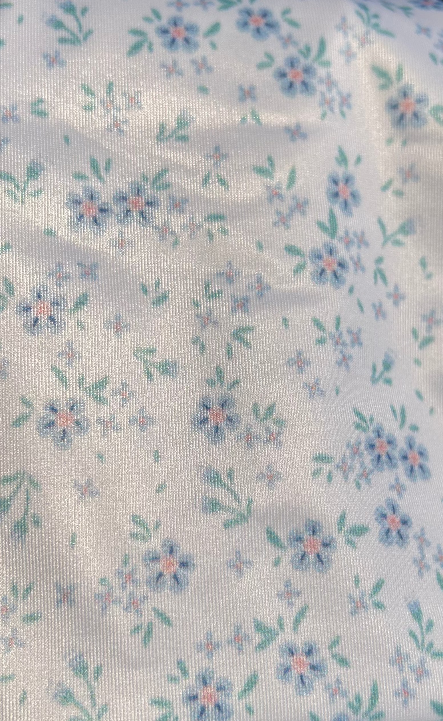 White blue orange green floral peonies recycled eco friendly bathing suit fabric