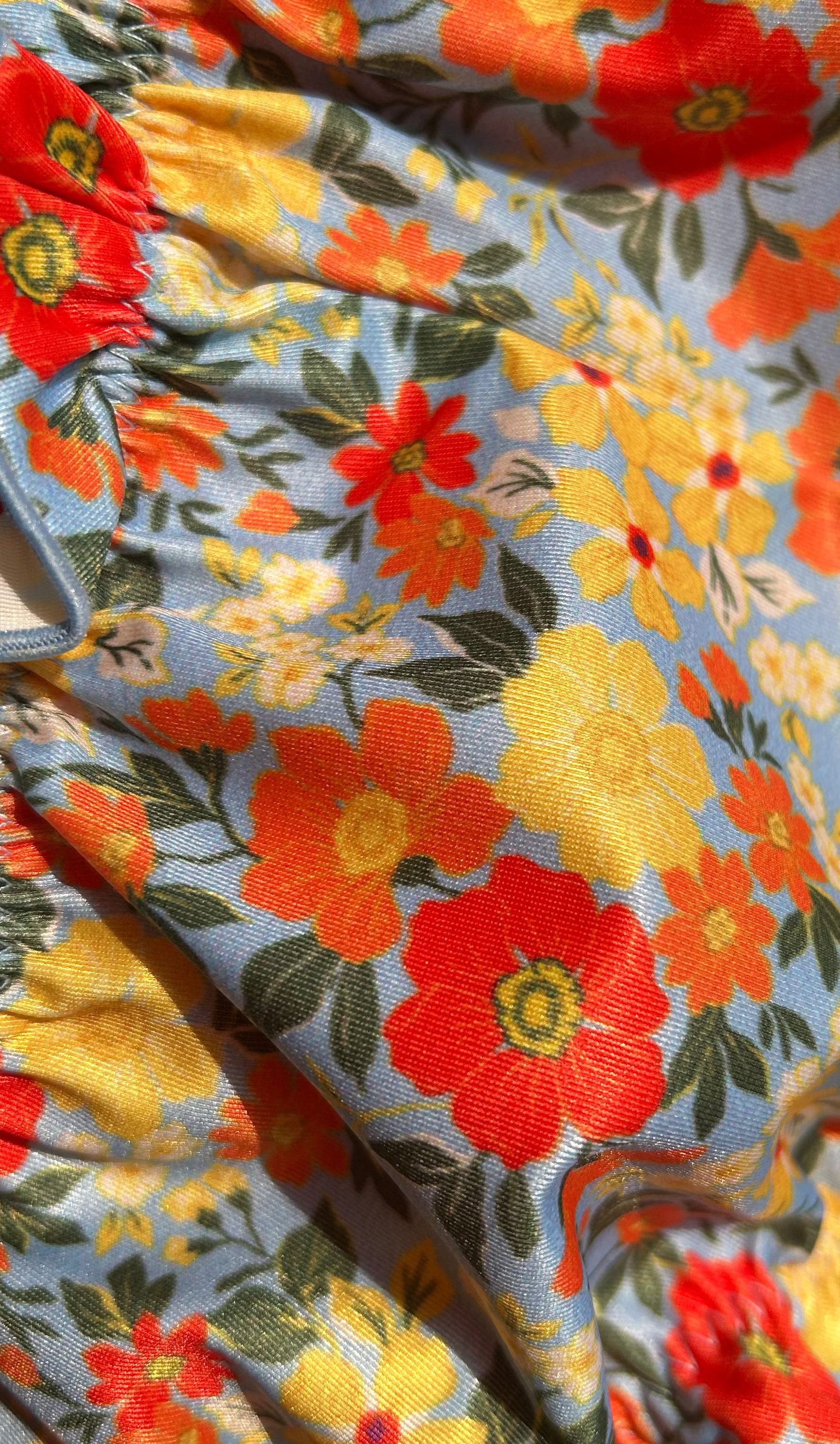 Red yellow light blue floral print recycled eco friendly bathing suit fabric